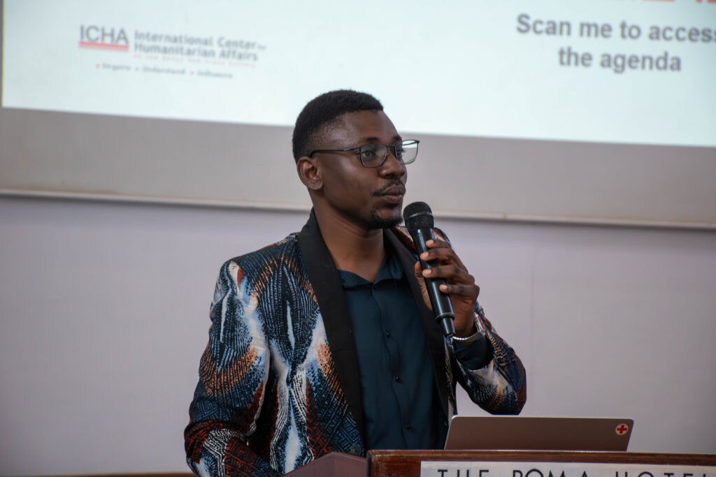 A speaker presenting during an ICHA knowledge event.