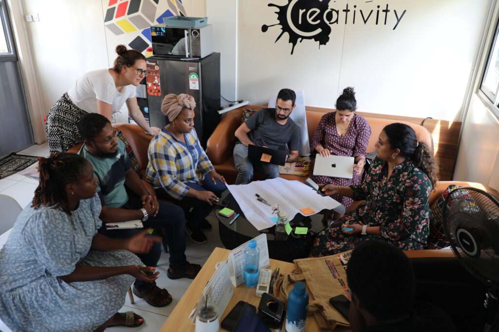 Participants working together during an ICHA learning session.